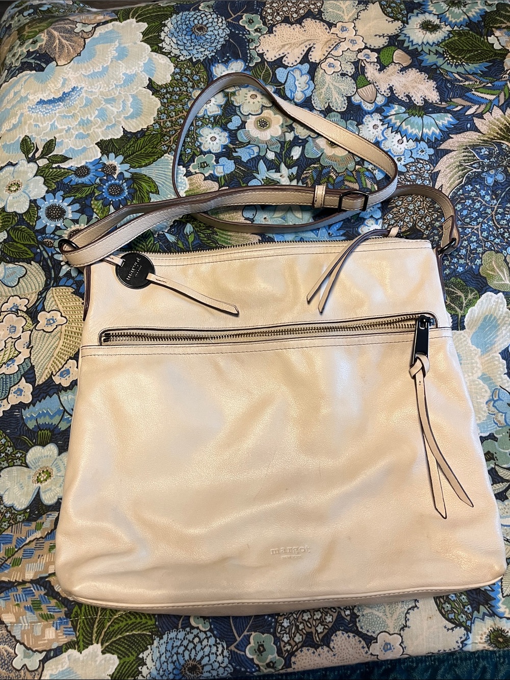 Margot New York Soft Cream Crossbody Bag with  Zip front and rear pockets